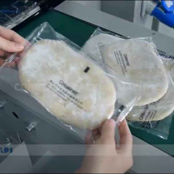 видео о работе машины для упаковки теста VT-160X 